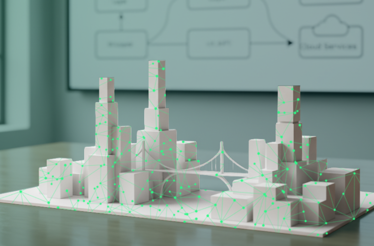 Weiße Miniaturstadt aus Blöcken mit Brücke, überzogen von grünen Netzwerklinien und Punkten; steht auf einem Tisch, Hintergrund zeigt Diagrammdarstellung.